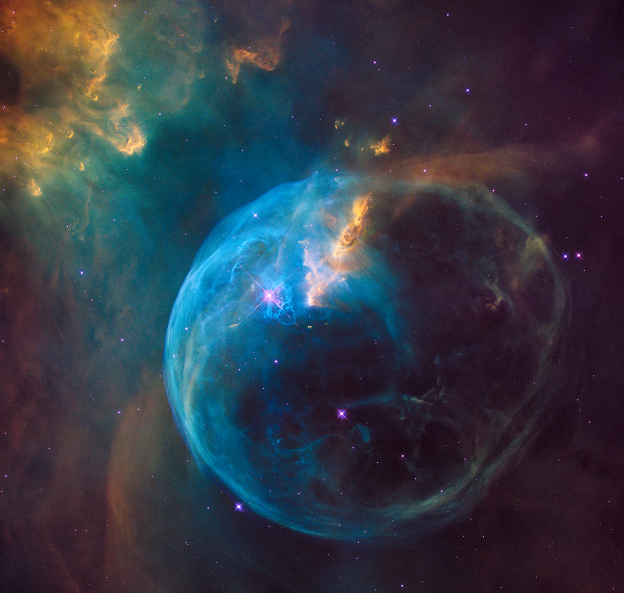 Image credit: NASA, ESA, and the Hubble Heritage Team (STScI/AURA), of the Bubble Nebula as imaged 229 years after its discovery by William Herschel.